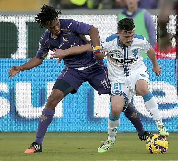 Fiorentina bloccata in casa nel derby con l'Empoli: viola avanti con Vargas, ma recuperati nella ripresa da Tonelli. Sciupata una buona occasione per avvicinarsi al terzo posto.