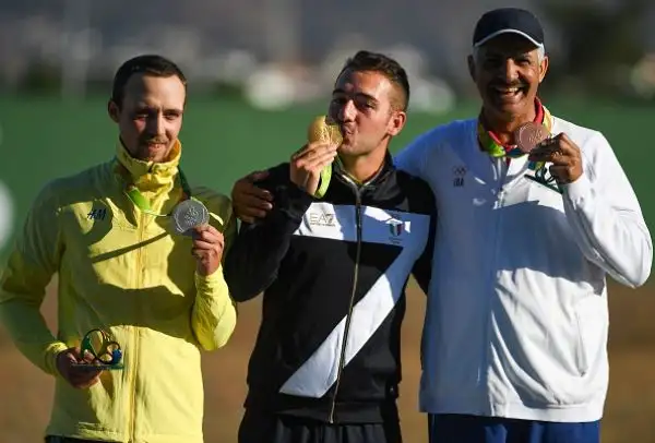 Il nostro tiratore ha conquistato la medaglia d'oro, al termine di una giornata assolutamente perfetta. Il ventunenne rompendo tutti i piattelli della finale ha battuto lo svedese Svensson.