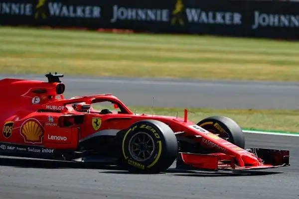 Sul podio anche l'inglese della Mercedes e l'altro ferrarista Raikkonen.