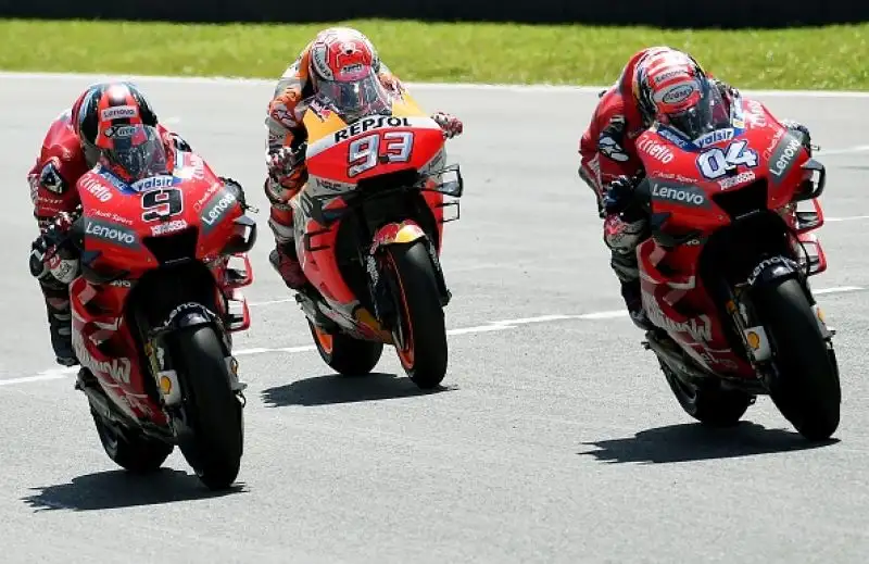 Sul podio con l'italiano e il Campione del mondo anche il compagno di squadra Dovizioso, quarta la Suzuki di Rins.