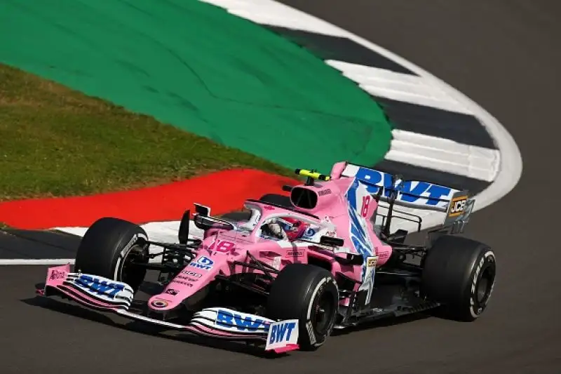 Il pilota delle Red Bull sul podio con Hamilton e Bottas. 