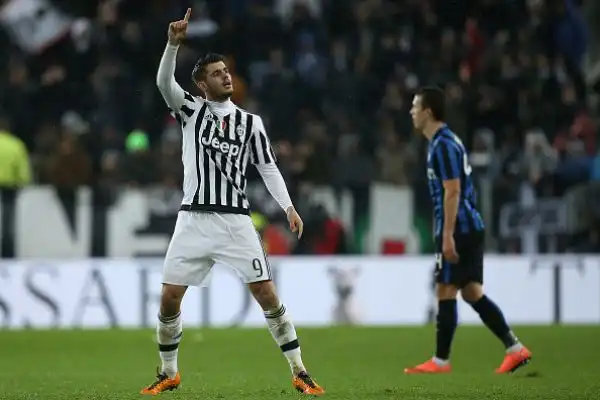 Morata 7. Entra col giusto atteggiamento, guadagnandosi e trasformando il rigore della sicurezza.