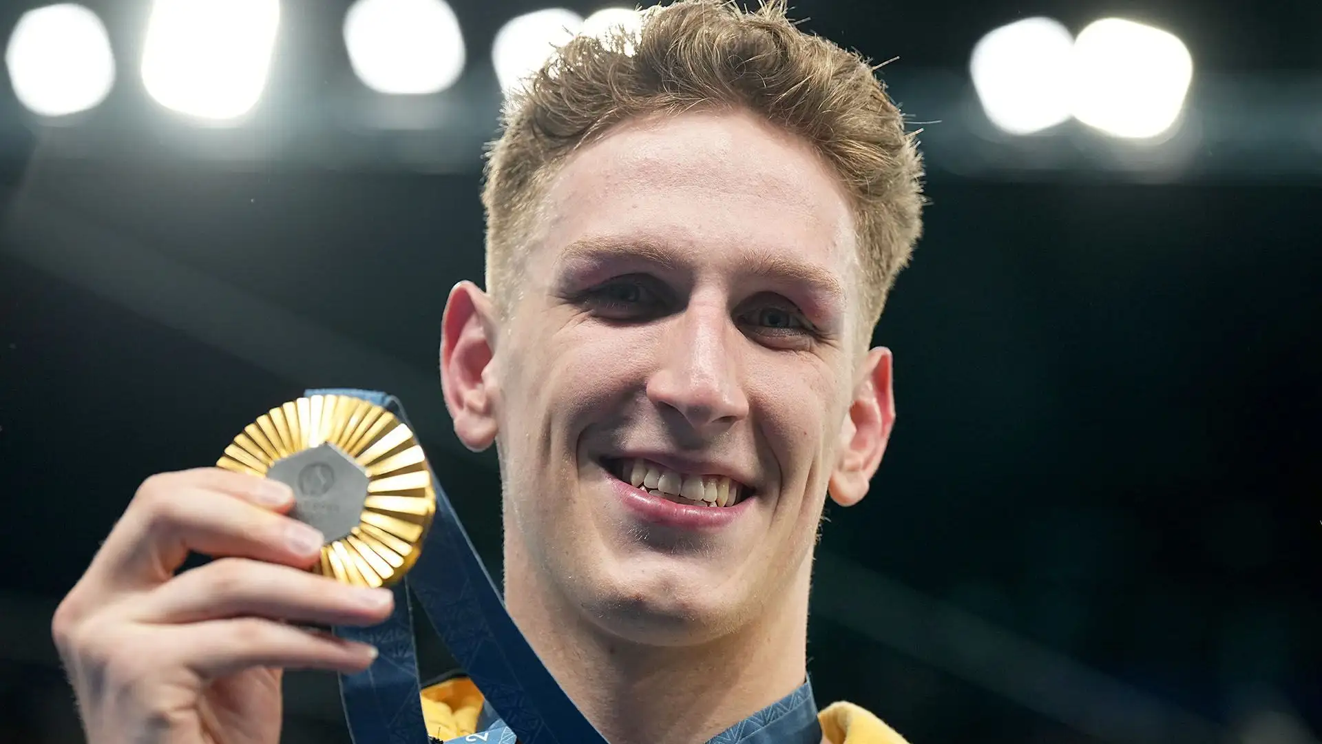 Ha vinto il suo primo oro olimpico nei 400 metri stile libero ai Giochi Olimpici di Parigi
