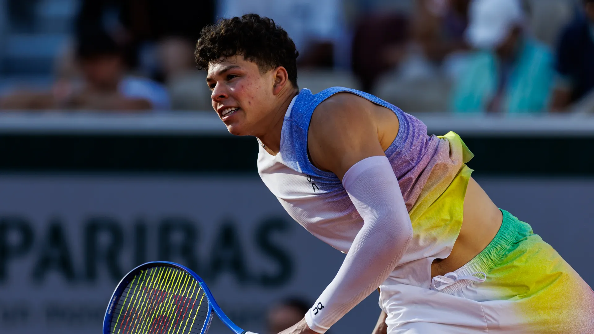 L'asso della racchetta è figlio dell'ex tennista Bryan Shelton
