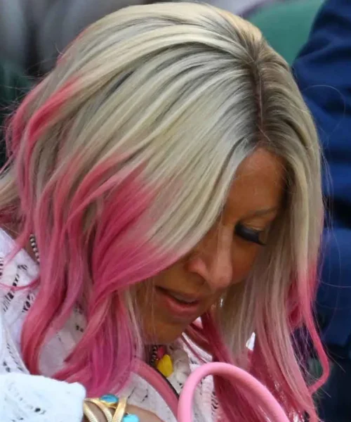 Le foto: il look della terza moglie del campione non passa inosservato a Wimbledon