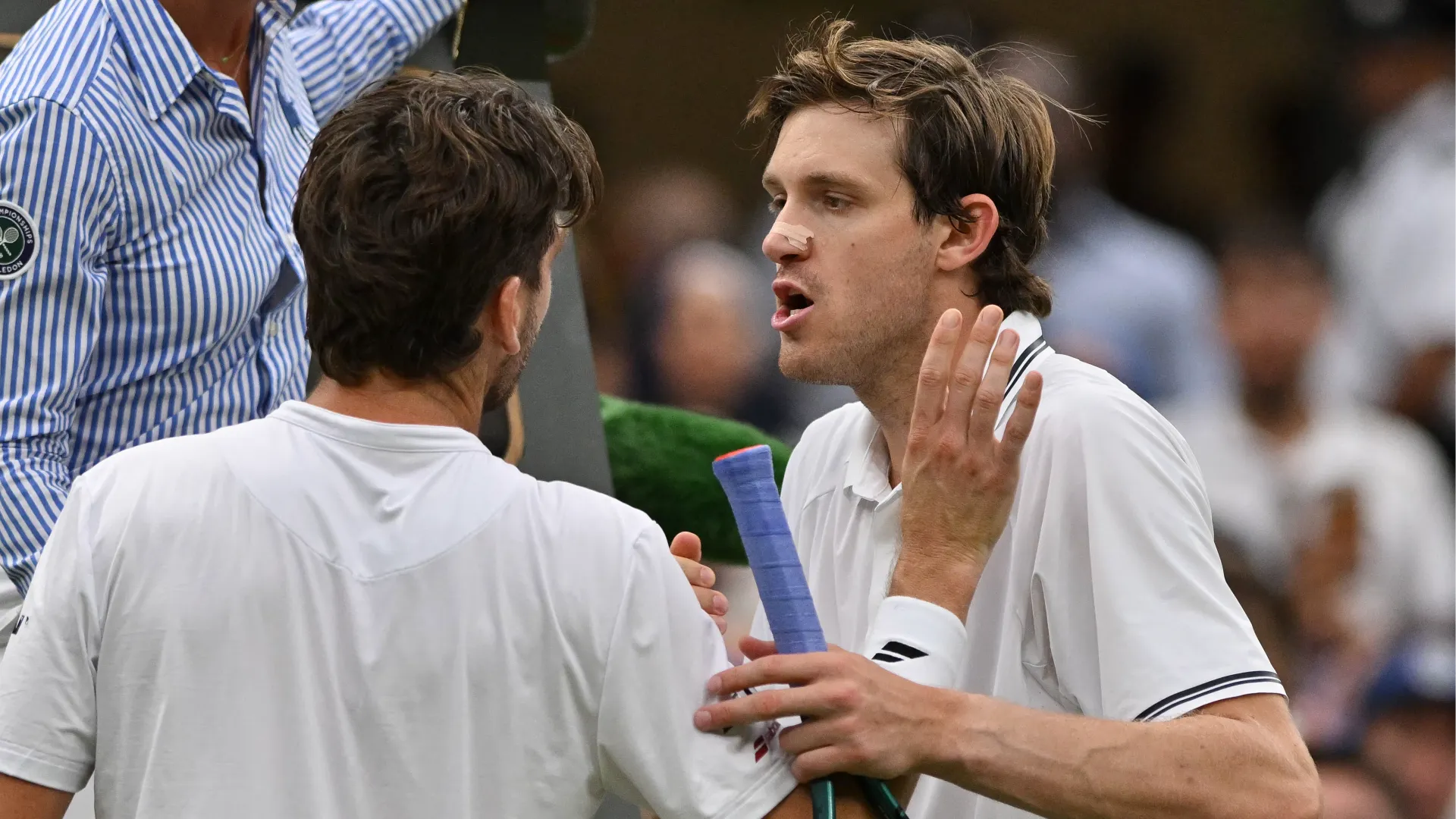 Lite furiosa al termine della partita: le foto da Wimbledon
