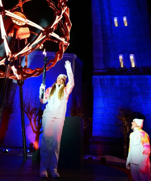 Le foto di Sofia Goggia che accende il braciere olimpico a Cortina